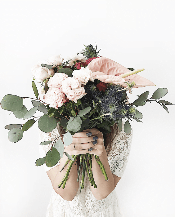 Discomfort and success concept woman with flowers