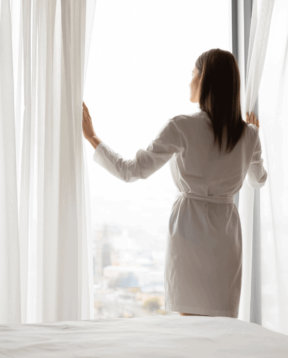 Growing pains concept woman looking out window