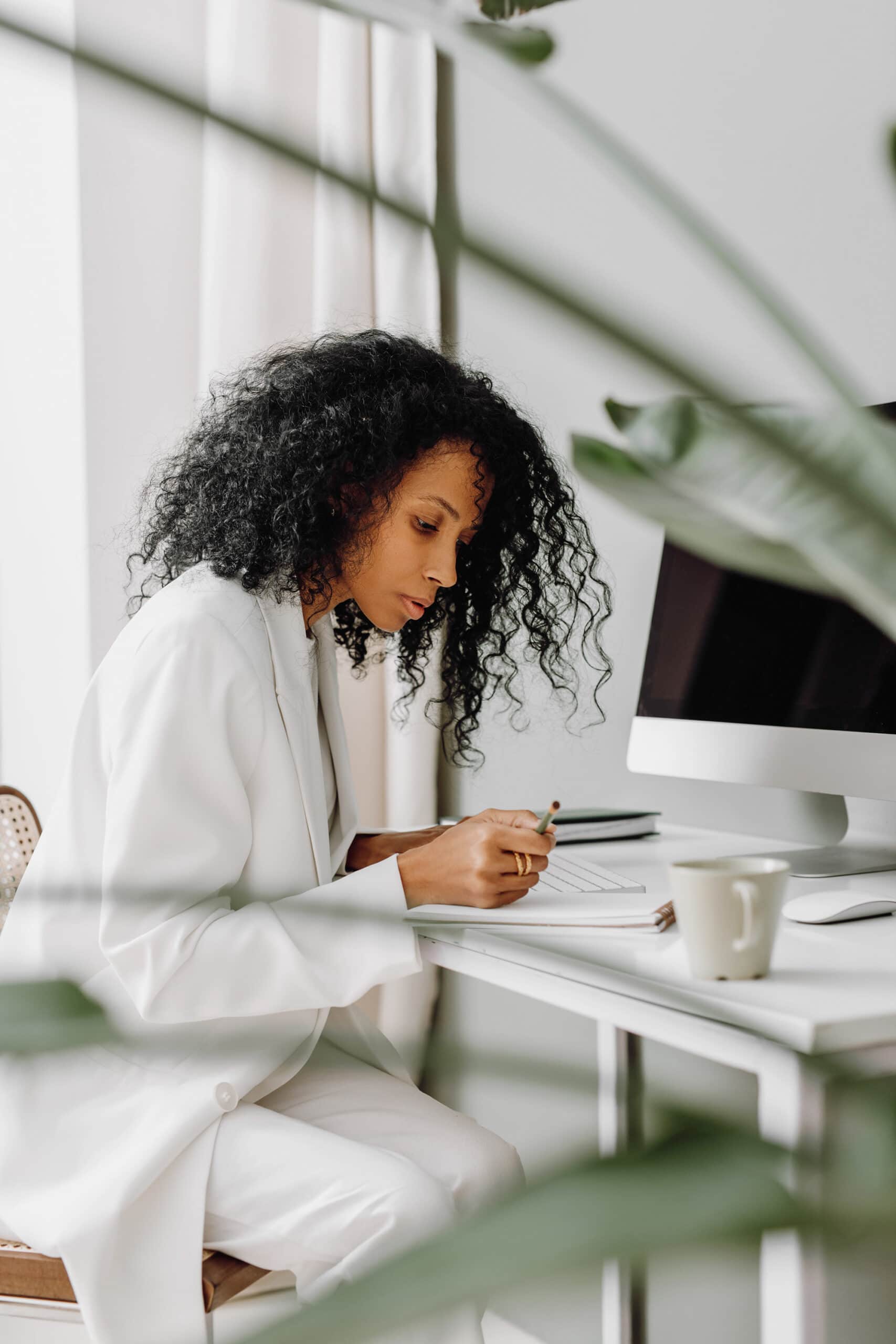 Modern Green Workspace woman working at desk